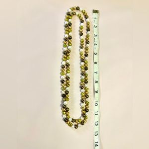 Good quality gold/green/pearl long necklace. Can be used long or as 2 strands.